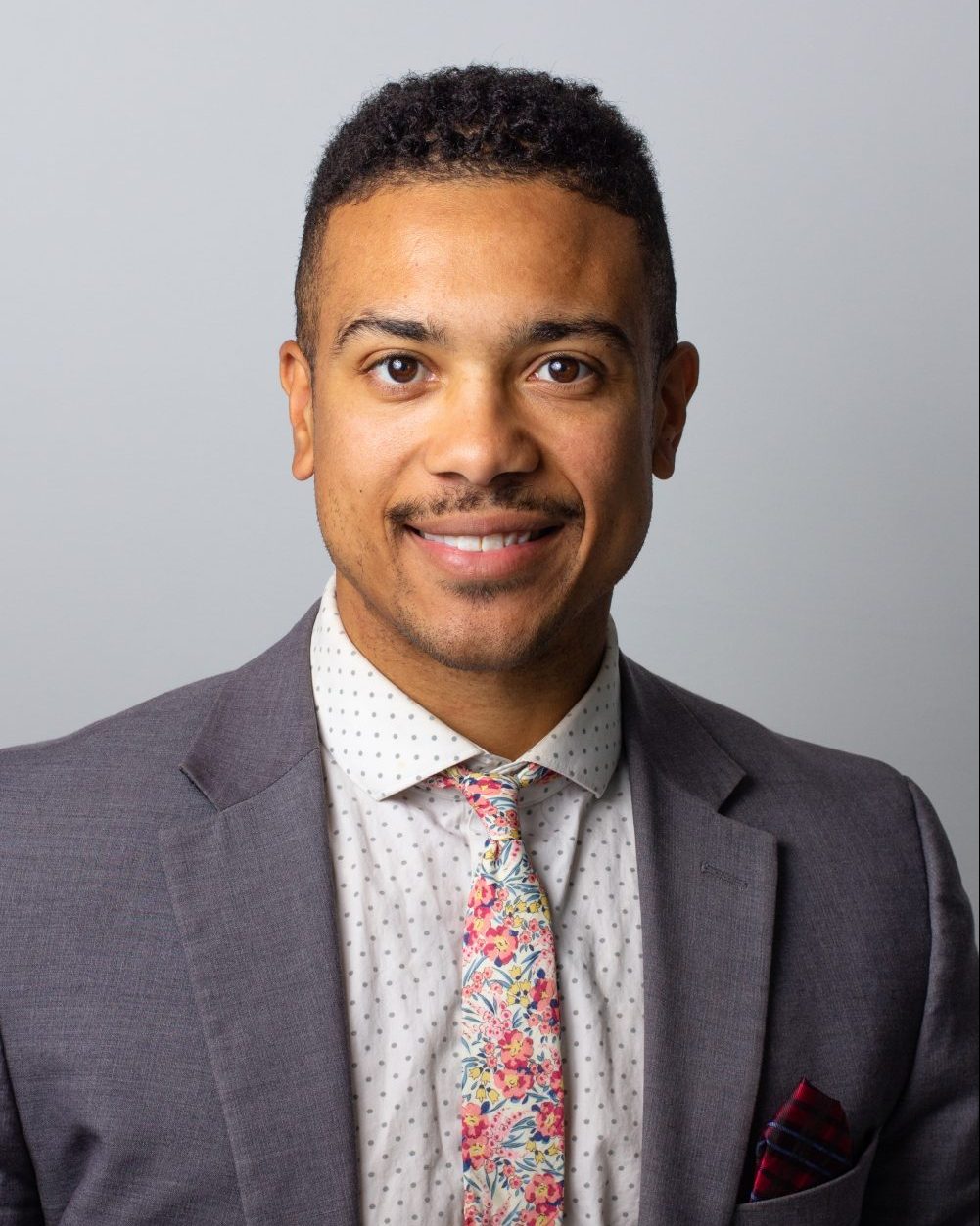Dr. Tayo Moss